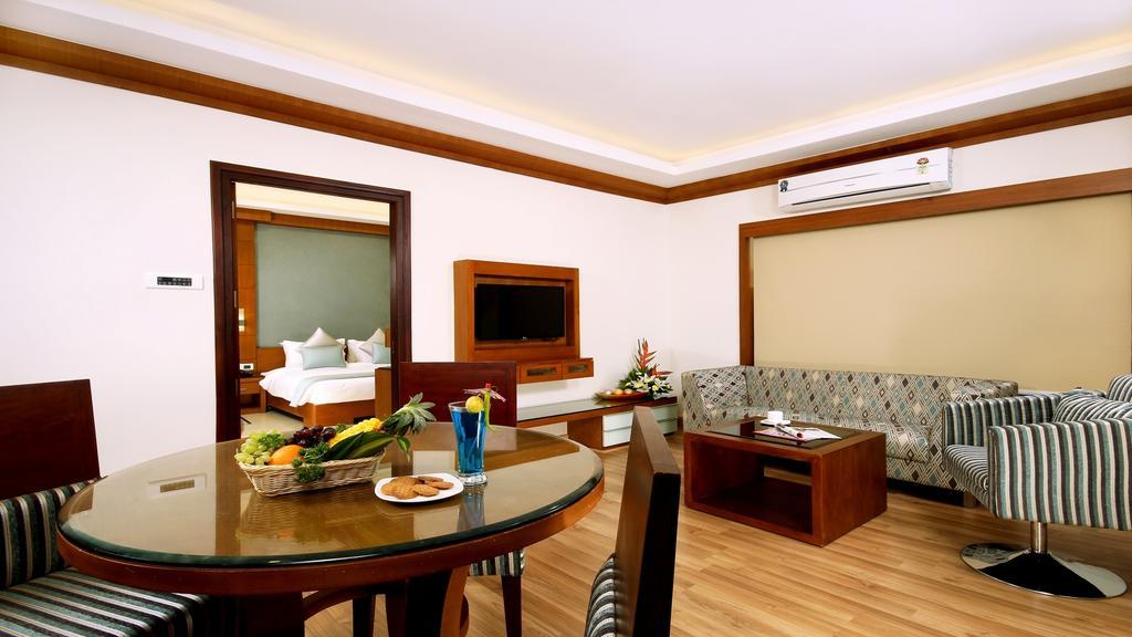 Hotel Chrysoberyl Kottayam Quarto foto